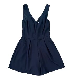 Francesca’s Mi Ami Black Sleeveless V-Neck Romper with Pockets